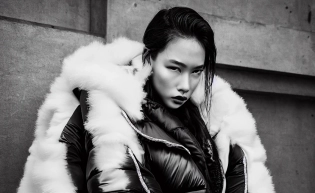well lit fashion shoot portrait of extremely beautiful female wearing massively over size puffer jacket by craig green, dingyun zhang, yeezy, balenciaga, vetements, sharp focus, clear, detailed, , cinematic, detailed, off white, glamourous, symmetrical, vogue, editorial, fashion, magazine shoot, glossy
