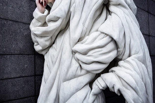 well lit fashion shoot portrait of extremely beautiful female marble statue wearing huge over size puffer jacket by dingyun zhang, yeezy, balenciaga, vetements, a cold wall, sharp focus, clear, detailed, , cinematic, detailed, off white, glamourous, symmetrical, vogue, editorial, fashion, magazine shoot, glossy