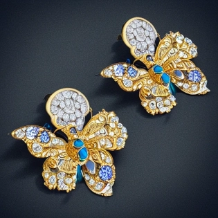 full display of baroque style jewelry design, a pair of earrings, blue gemstones with different saturation winged butterflies and four-leaf clover shaped diamonds, roses sharp, highly detailed vray render, flash, high quality, 10 k