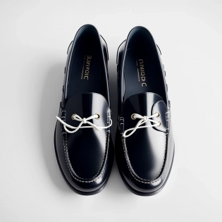 A beautiful 3/4 boat shoes, A+D magazine photography, 8k, isolated on white background