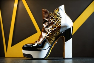 Get ready to be wowed by the most unique shoes in the world. These shoes feature a groundbreaking and breathtaking design that will leave you in awe. The futuristic sole is sleek and modern, made with cutting-edge materials that provide both comfort and support. The intricate heel is a work of art, boasting geometric patterns and bold colors that will undoubtedly catch everyone's attention.