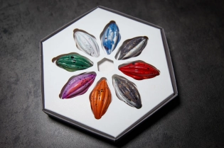 box of chocolates, chocolates made in italy , golden details, realistic, 4k,